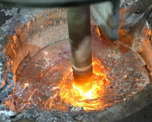 Degassing lance inside molten aluminum